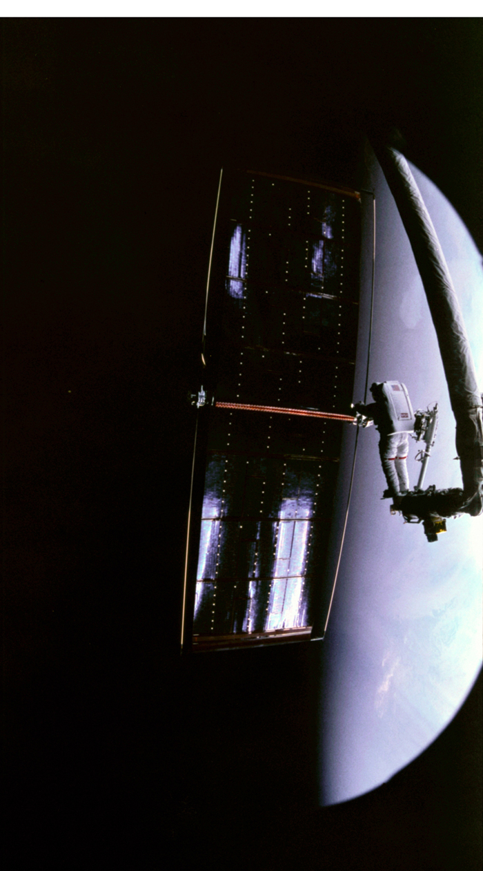 Space History Photo: Astronaut Kathy Thornton Prepares to Release Hubble Telescope's Solar Wing